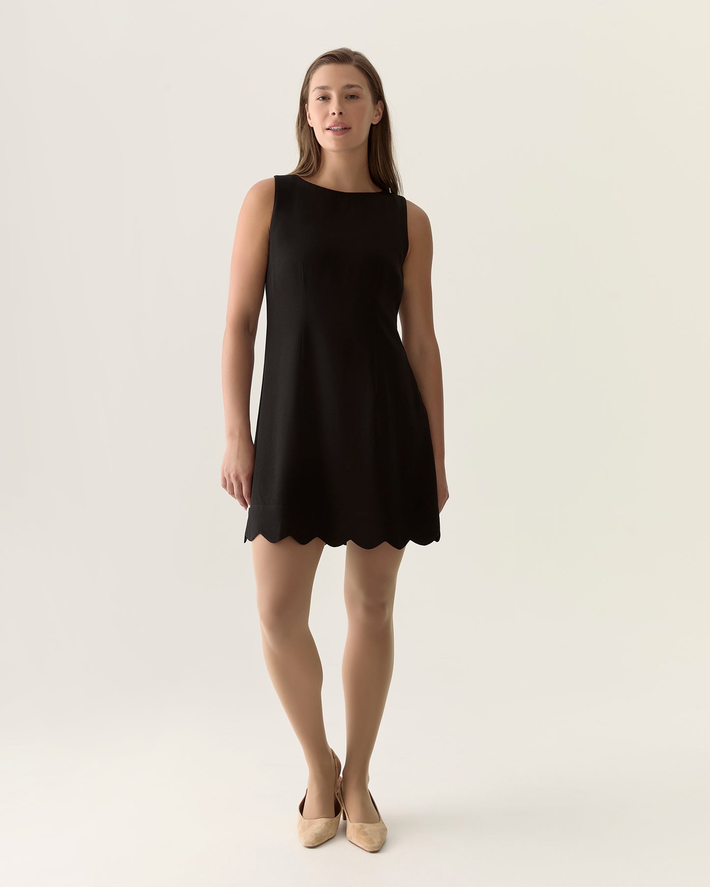 Scalloped sleeveless dress in Black
